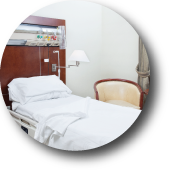 Image of Capital Bedding's Healthcare Line Logo. The logo is a photo of a bed in a hospital room.